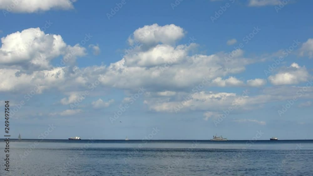 Calm Sea Landscape on Sunny Day Ships and White Clouds Calm Sea Landscape on Sunny Day Ships and White Clouds