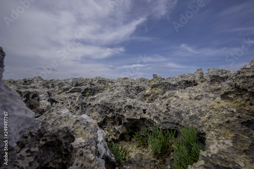 great rock texture close up photography, blue sky background 