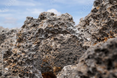 great rock texture close up photography, blue sky background 