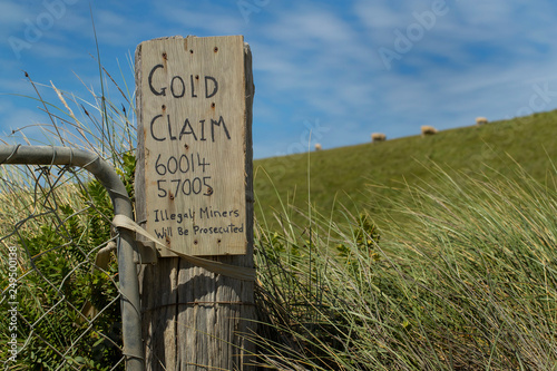 Orepuki. Te Waewae coast New Zealand Signs. Goldclaim photo