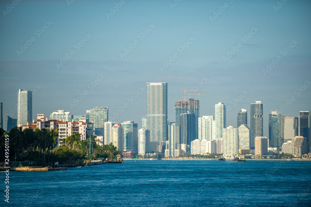 Bright tropical scenic view of the city skyline of Miami with waterfront greenery on Biscayne Bay