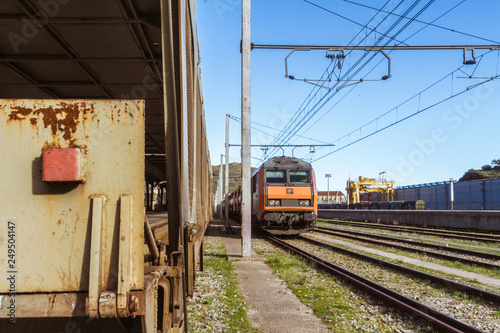 Railway station, merchand trains, transport of people and rails. photo