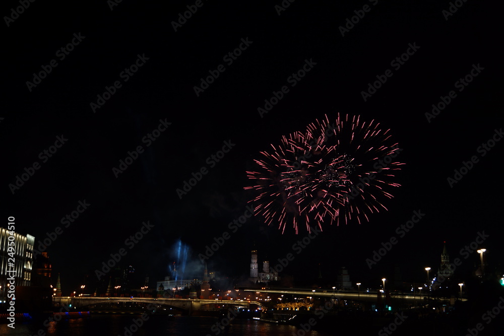 fireworks over the river. fireworks over the night city fireworks over the river. fireworks over the night city