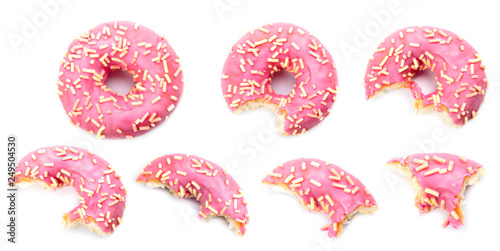 pink donut biting on white background
