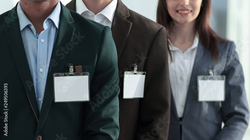 Obraz na płótnie group of young business people with blank badges. w salonie