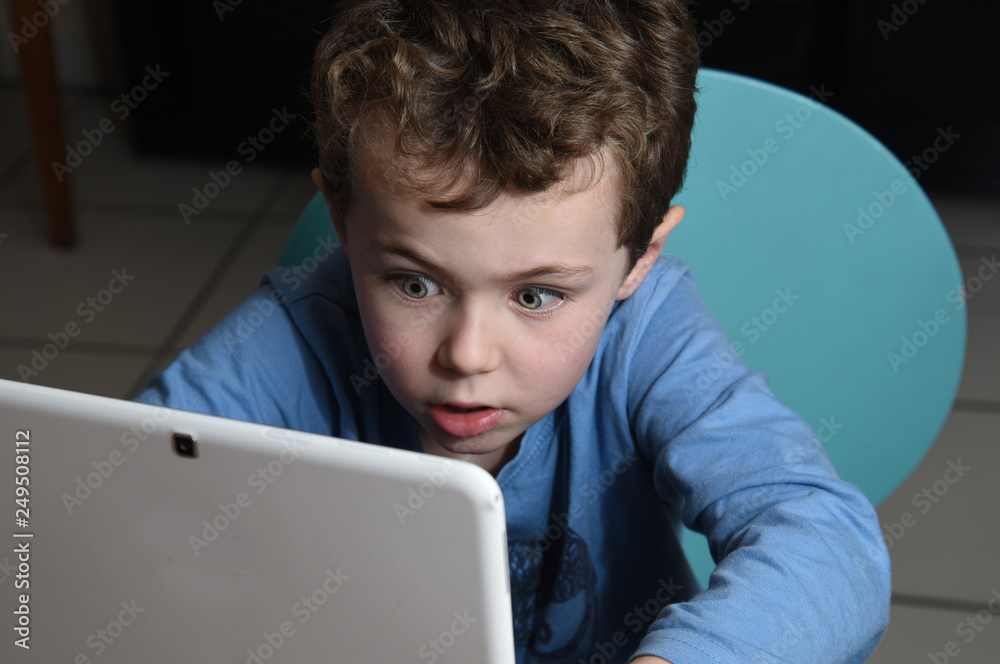 Child with tablet Child with tablet