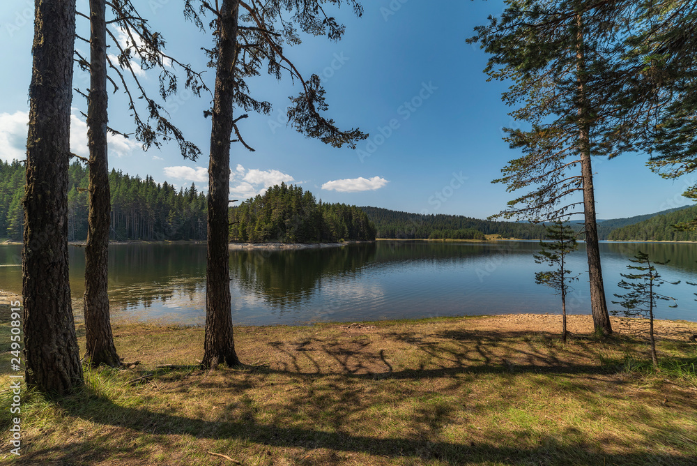 Impressively beautiful Fairy-tale mountain lake with crystal clear water Breathtaking Scene. Impressively beautiful Fairy-tale mountain lake with crystal clear water Breathtaking Scene.