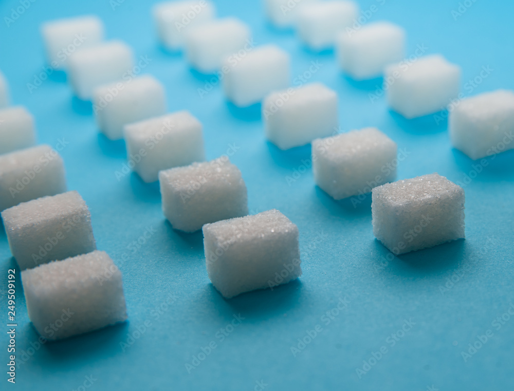 Sugar squares on blue background. Sugar squares on blue background.