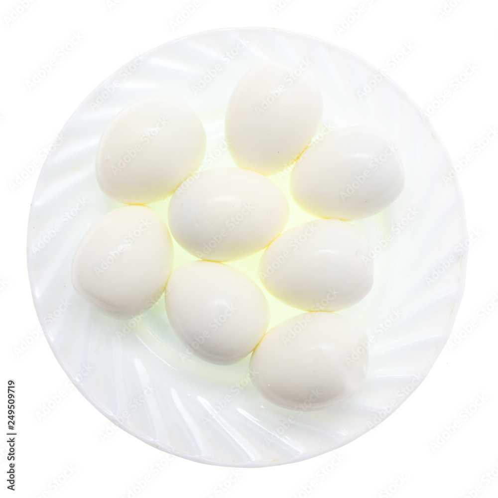 Peeled boiled eggs in a plate on a white background Peeled boiled eggs in a plate on a white background