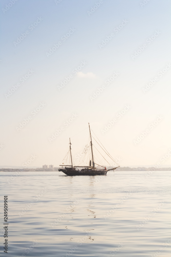 sailboat sailing on sea against sky