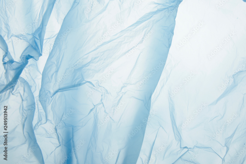 Obraz premium Light blue plastic garbage bag material as a background