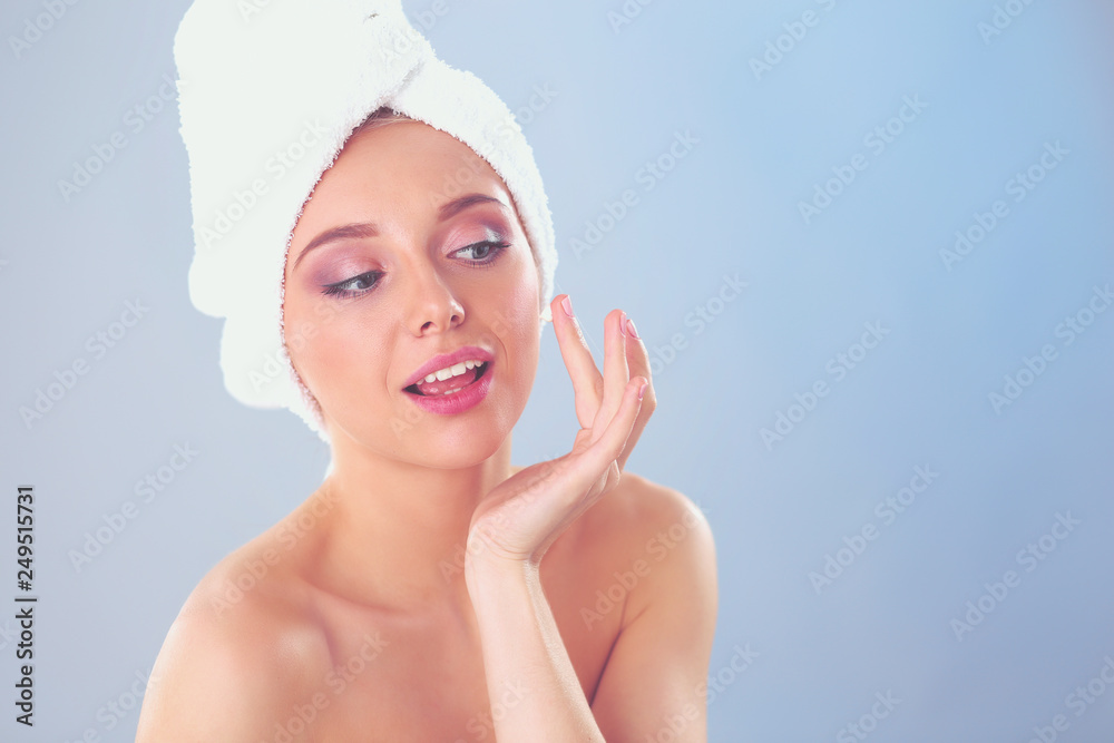 A beautiful woman, portrait isolated on blue background. A beautiful woman. A beautiful woman, portrait isolated on blue background. A beautiful woman.