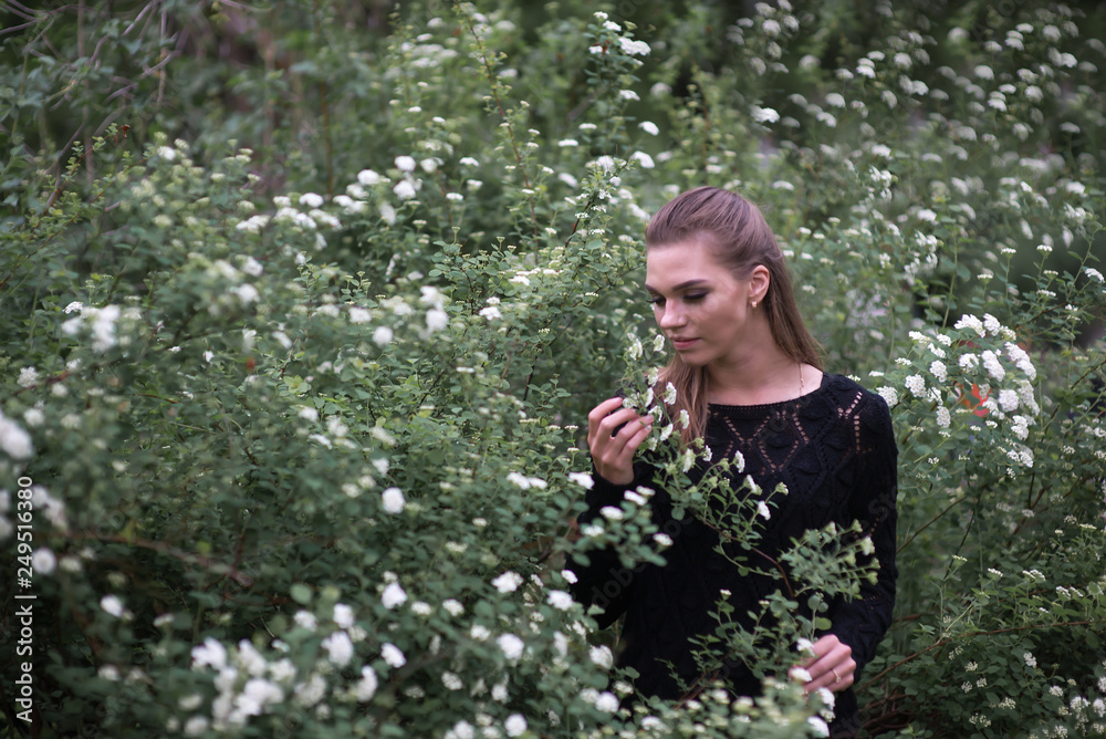 Beautiful girl on the background of spring bush Beautiful girl on the background of spring bush