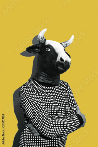 young man with a cow mask