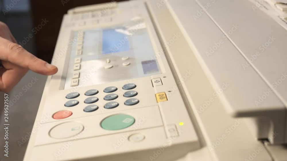 Detail of a modern digital printer of a copy center Detail of a modern digital printer of a copy center