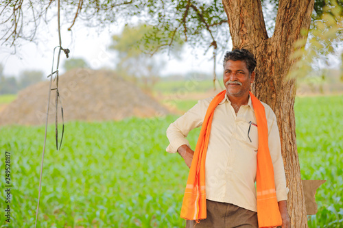 Indian farmer at field © Niks Ads