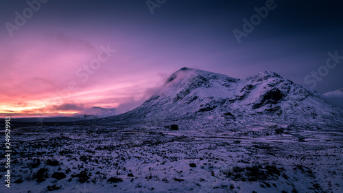 Sunrise winter snow mountain landscape in Glencoe Scotland