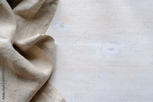 Fotografija Folded gathered border of a natural linen fabric