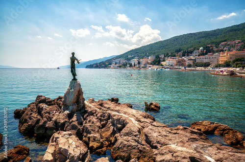 The historic statue of Maiden with the seagull is a symbol, not only of Opatija, but the entire Kvarner region. The statue on Adriatic coast is in the touristic town of Opatija in Croatia, Europe photo