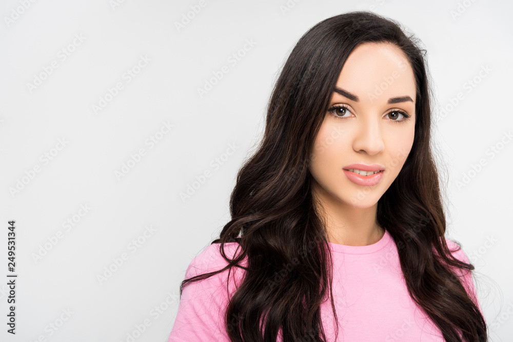 beautiful girl looking at camera isolated on grey beautiful girl looking at camera isolated on grey
