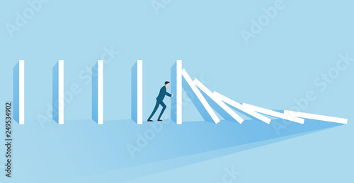 Business concept of a businessman trying to stop domino effect Banner Concept