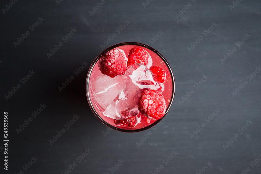 Sweet raspberry Tom collins cocktail. Selective focus. Shallow depth of field. Sweet raspberry Tom collins cocktail. Selective focus. Shallow depth of field.