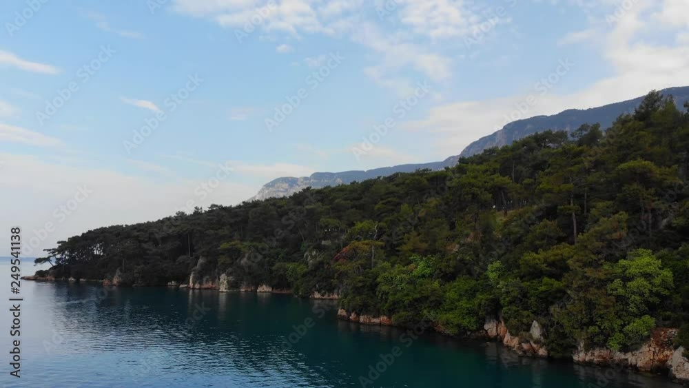 An idyllic aerial view of Gulf of Gokova coastline (the Aegean Sea) under the summer skies… An idyllic aerial view of Gulf of Gokova coastline (the Aegean Sea) under the summer skies…