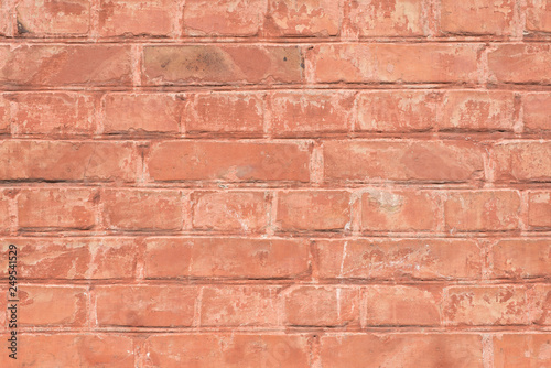 Brick wall with terracotta paint. Abstract background