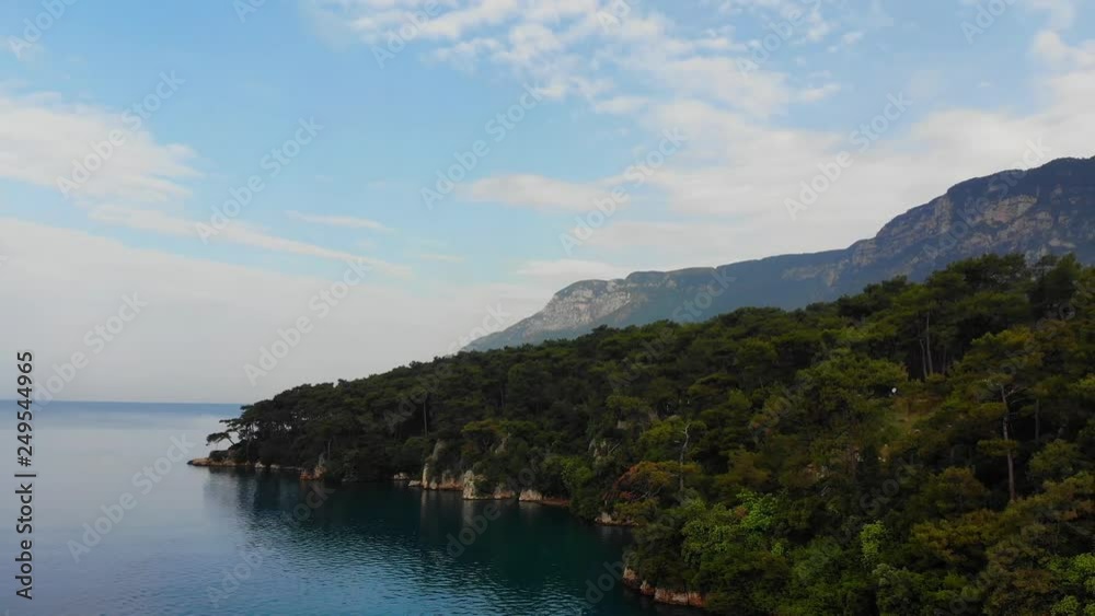 An idyllic aerial view of Gulf of Gokova coastline (the Aegean Sea) under the summer skies… An idyllic aerial view of Gulf of Gokova coastline (the Aegean Sea) under the summer skies…