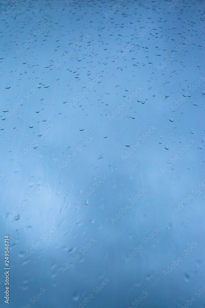 raindrops on the window against the sky