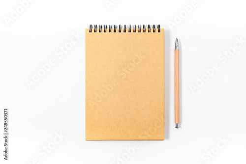 Brown spiral notebook isolated on white background.top view