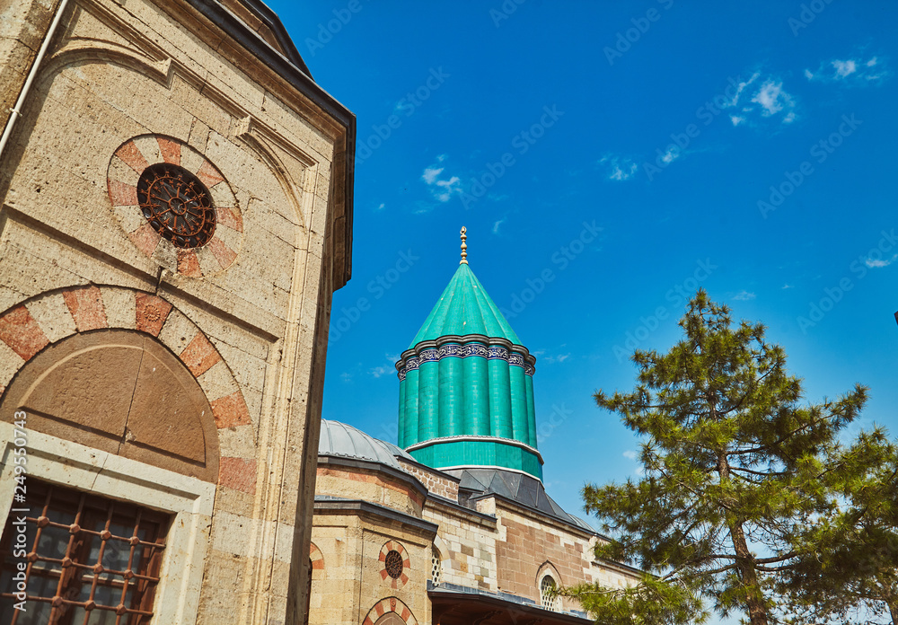 Fototapeta premium Mevlana tomb and Selimiye mosque at Konya, Turkey known also as mevlana kulliyesi or mevlana turbesi and Selimiye camii