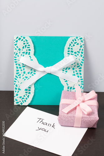Handmade greeting cards. Near gift in wrapping paper, tied with a ribbon. Original gift. © f2014vad