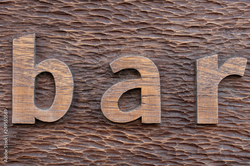 Bilde på lerret Old carved wood texture. Word Bar