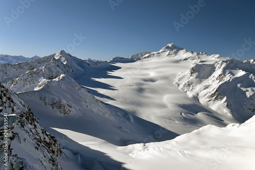 SOELDEN, AUSTRIA, A view over Rettenbach Glacier in Tirol, one of the Austrias largest glacier areas, with perfectly groomed slopes surrounded by the stunning Alpine scenery.