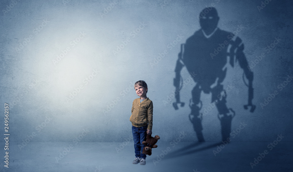 Little boy s self image appear as a big robotman shadow on his background
Little boy s self image appear as a big robotman shadow on his background