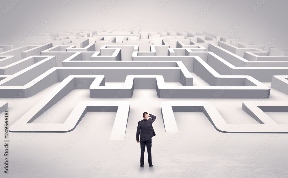 Businessman getting ready to enter a 3D flat labyrinth concept
Businessman getting ready to enter a 3D flat labyrinth concept
