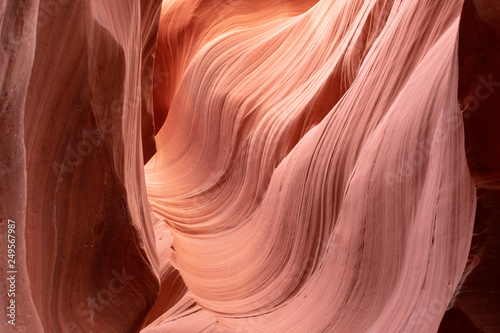 Lower Antelope Canyon - guided tour to scenic, twisting, narrow, sandstone and limestone walls of winding slot canyon curved by flash flood in American Southwest, Navajo Tribal Park, Page, Arizona