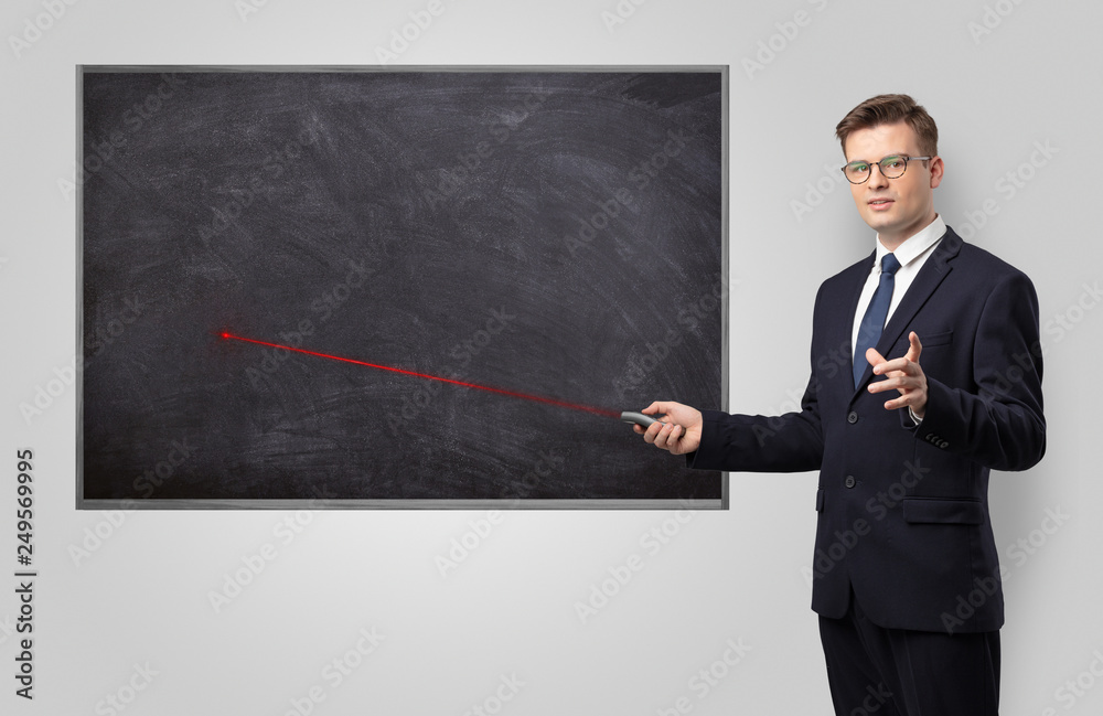 Handsome young teacher with laser pointer teaching
Handsome young teacher with laser pointer teaching