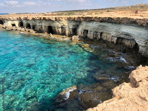 a popular place on the coast of Cyprus, a beautiful rocky coastline on a Sunny summer day