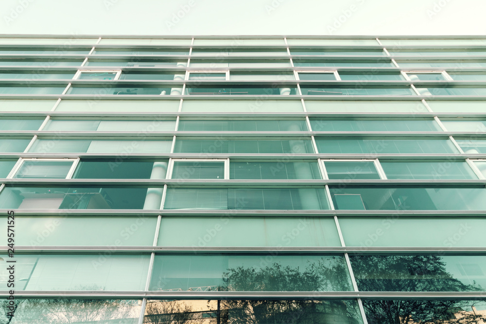 Obraz premium Urban architecture. Close up of an office building facade.