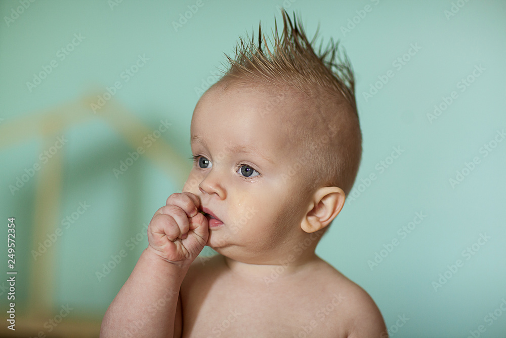 Baby with a beautiful haircut l. Grey eyes Baby with a beautiful haircut l. Grey eyes