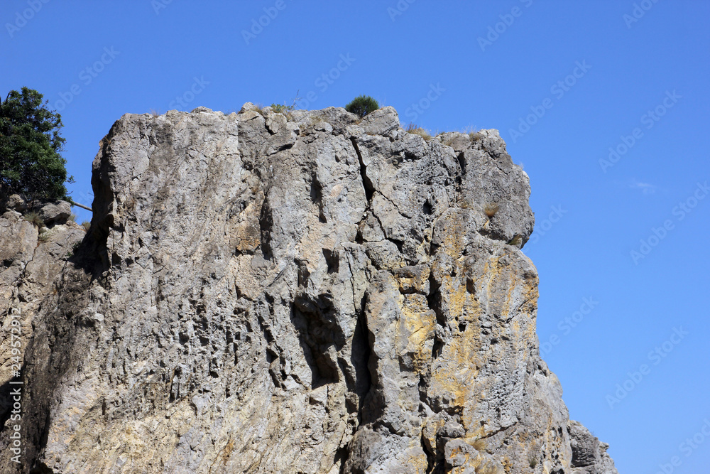 beautiful panoramic view of a large table steep stone cliff on the blue sky in Crimea beautiful panoramic view of a large table steep stone cliff on the blue sky in Crimea
