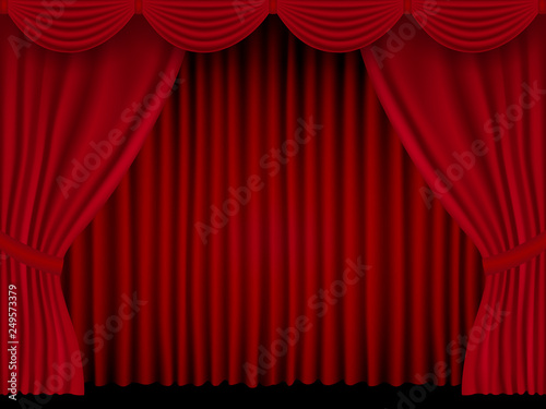Beautiful red theatre folded curtain drapes on black stage.