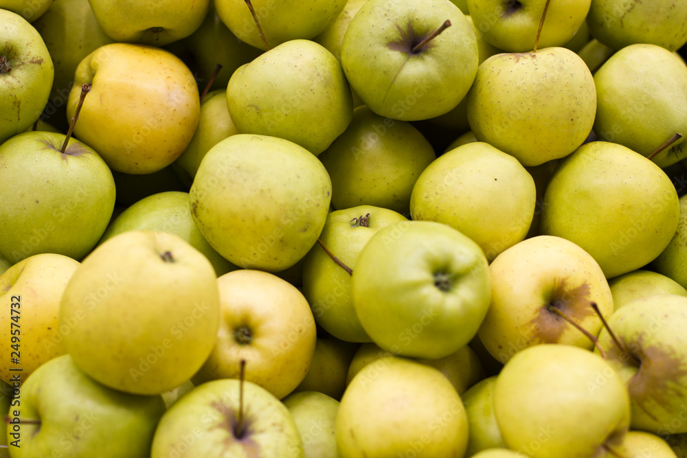 apples on the counter in the vegetable department of the supermarket apples on the counter in the vegetable department of the supermarket