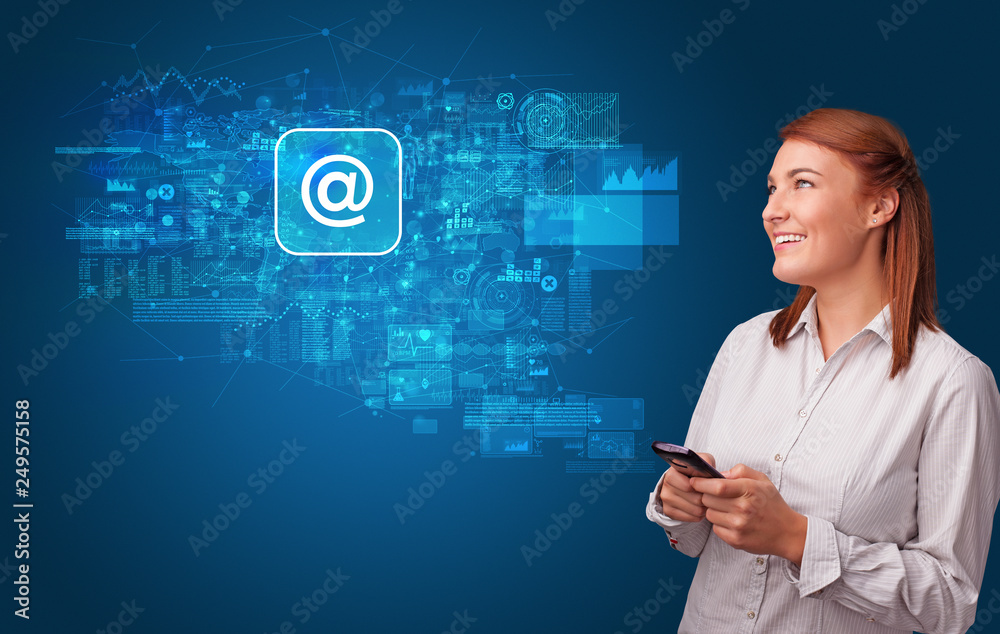 Young person using phone with mail and online communication concept
Young person using phone with mail and online communication concept