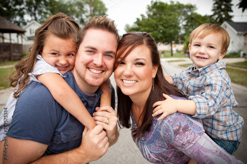 Happy Young Family Together Outside