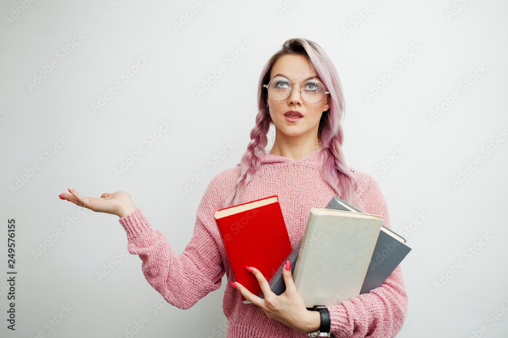 Student. Young woman with books. Nice girl is ready to learn Student. Young woman with books. Nice girl is ready to learn