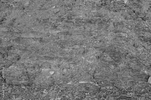 Vertical limestone texture. Black and white limestone background for publication, screensaver, wallpaper, postcard, poster, banner, cover, title for a website. High quality photography