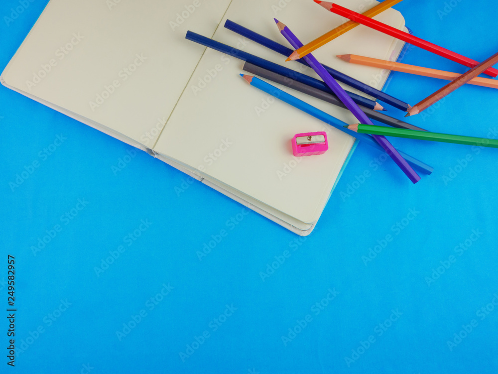 Flat lay,top view stationery for creative and students on blue background with copy space art,education concept Flat lay,top view stationery for creative and students on blue background with copy space art,education concept